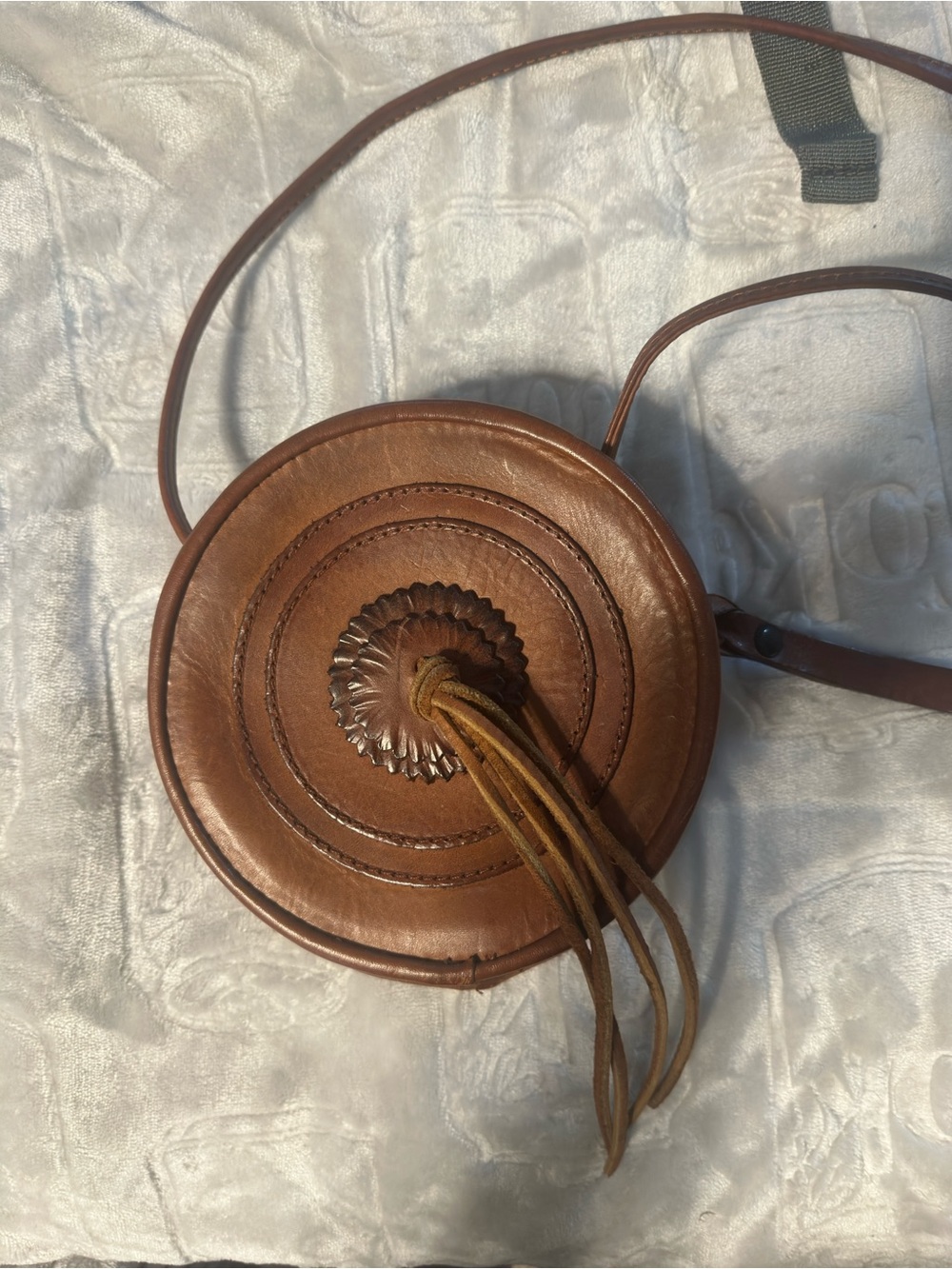 Frye  Concha Round Brown Leather Crossbody with Tassel Detail